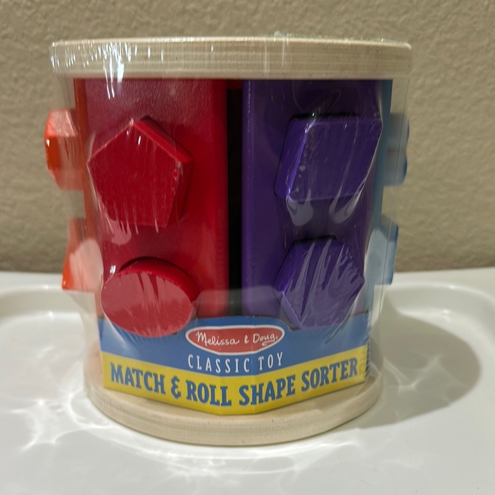 Melissa & Doug Red and Purple Learning Toys Match & Roll Shape Sort Set